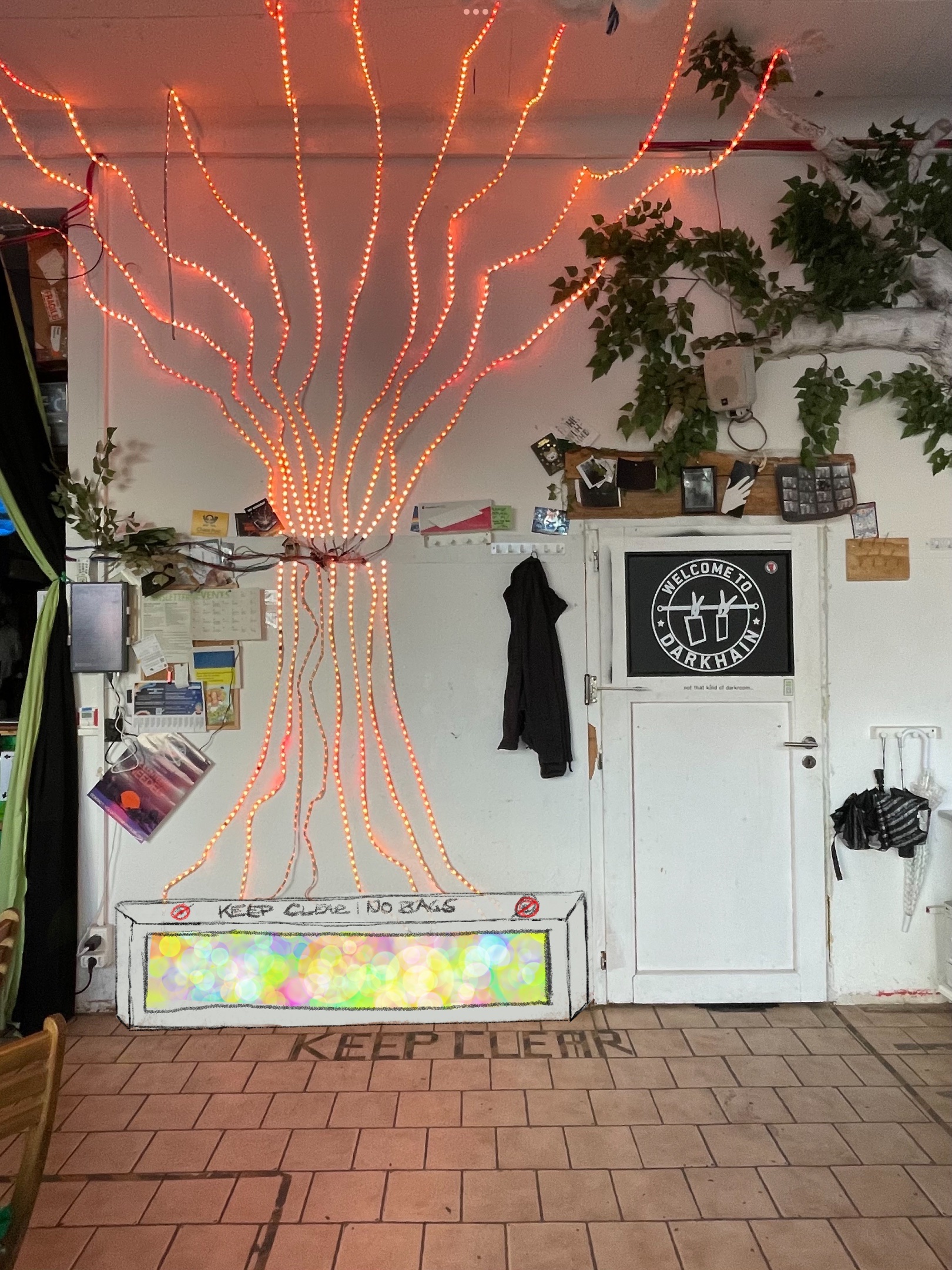 A knee high box drawn under the LED tree installation